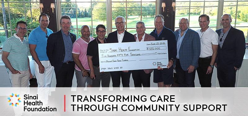Image of Sinai health supporters with a large check for $555,000 with text below: Transforming Care through Community Support