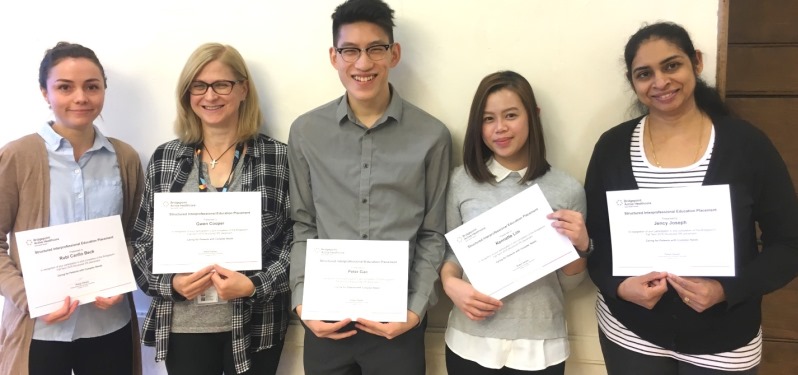 Students in the Interprofessional Placement at Bridgepoint with certificates for completing the program. From left to right are, Rubi (Social Work), Gwen (Therapeutic Recreation), Peter (Pharmacy), Kennette (Nursing) and Jency (nursing).