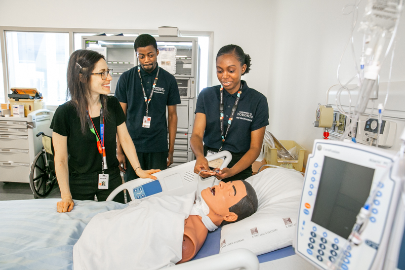 At Bridgepoint, Joel and Leah visited the learning lab used for training and practicing clinical skills. Here, Krystal, Interim Manager, Professional Practice, Nursing, shows how nurses practice suctioning a breathing tube (tracheostomy).
