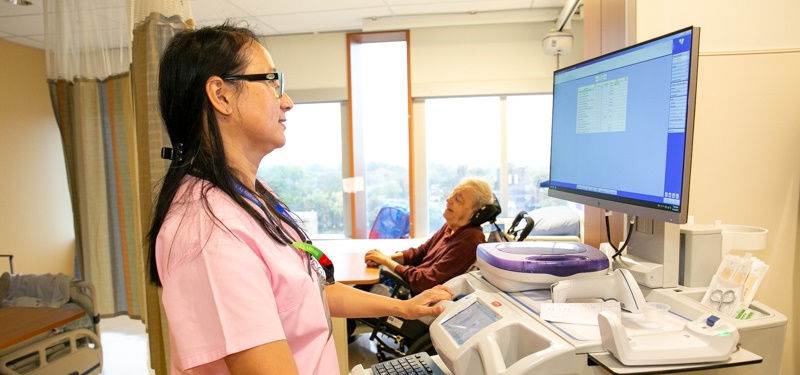 photo of  a nurse using Closed Loop Order System